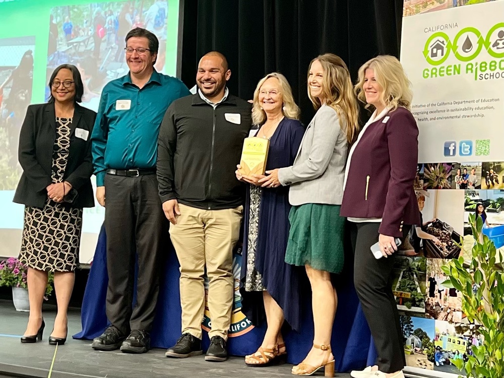 Parkview Staff and the superintendent receiving the Green Ribbon award
