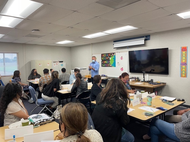 New teachers meeting with Dr. Dominguez.