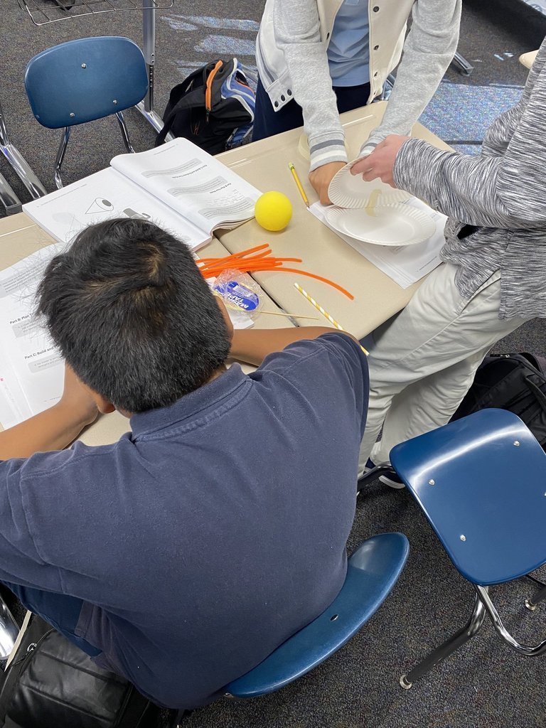 student working on model